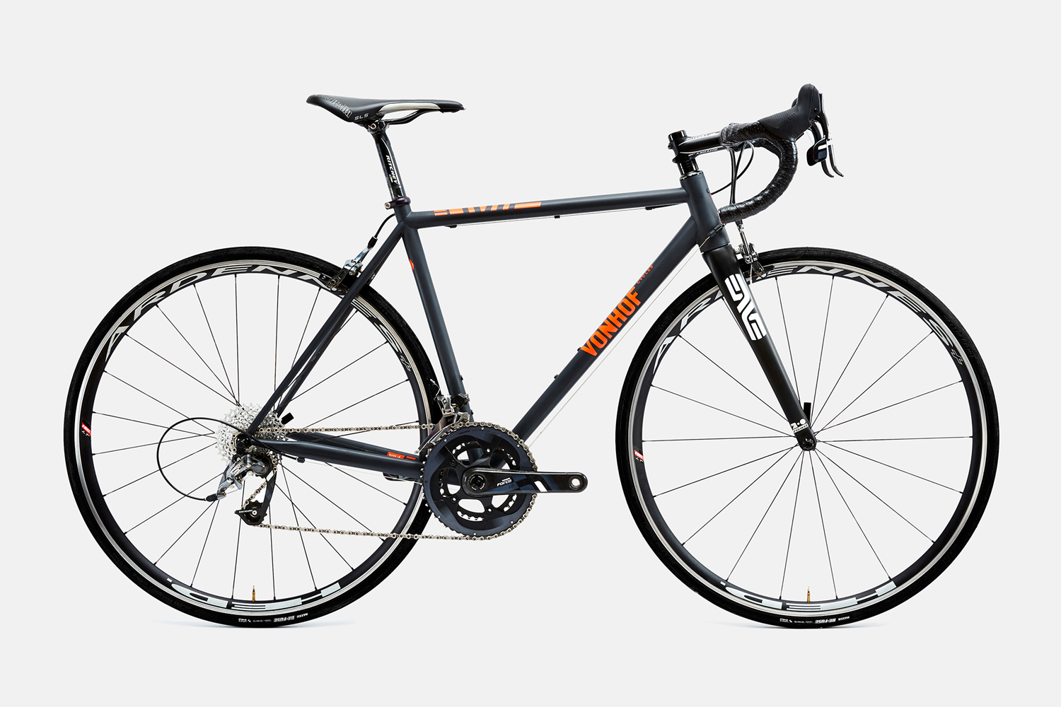 Studio product photograph of a dark grey and orange road bicycle against a plain white seamless background.
