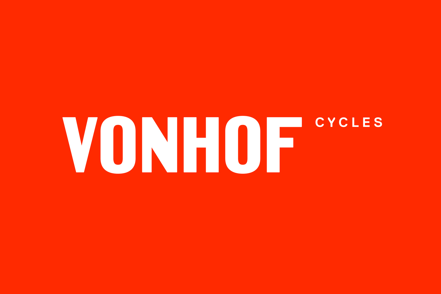 Bold white typography displaying Vonhof Cycles against a solid vibrant red background.