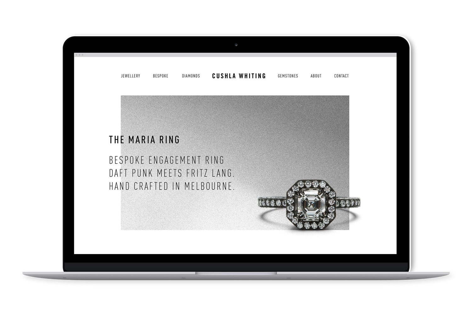 Laptop displaying the Cushla Whiting jewellery website homepage featuring The Maria Ring on a textured grey background.