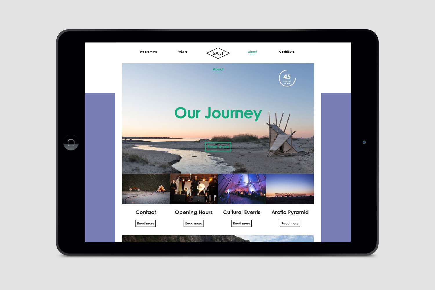 Digital tablet displaying the Salt brand website homepage with a landscape photo and menu items on a white background