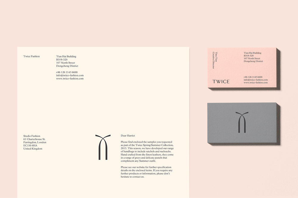 Minimalist brand identity stationery featuring letterhead and stacked business cards for Twice fashion.