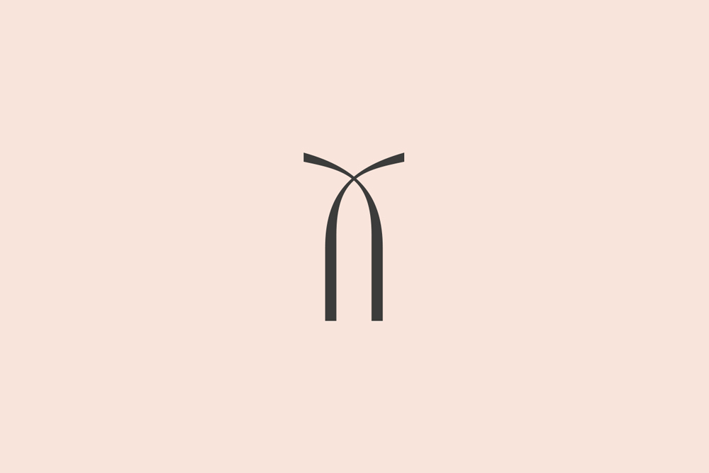 Minimalist graphic logo design featuring a dark stylized monogram emblem centered against a solid warm beige background.