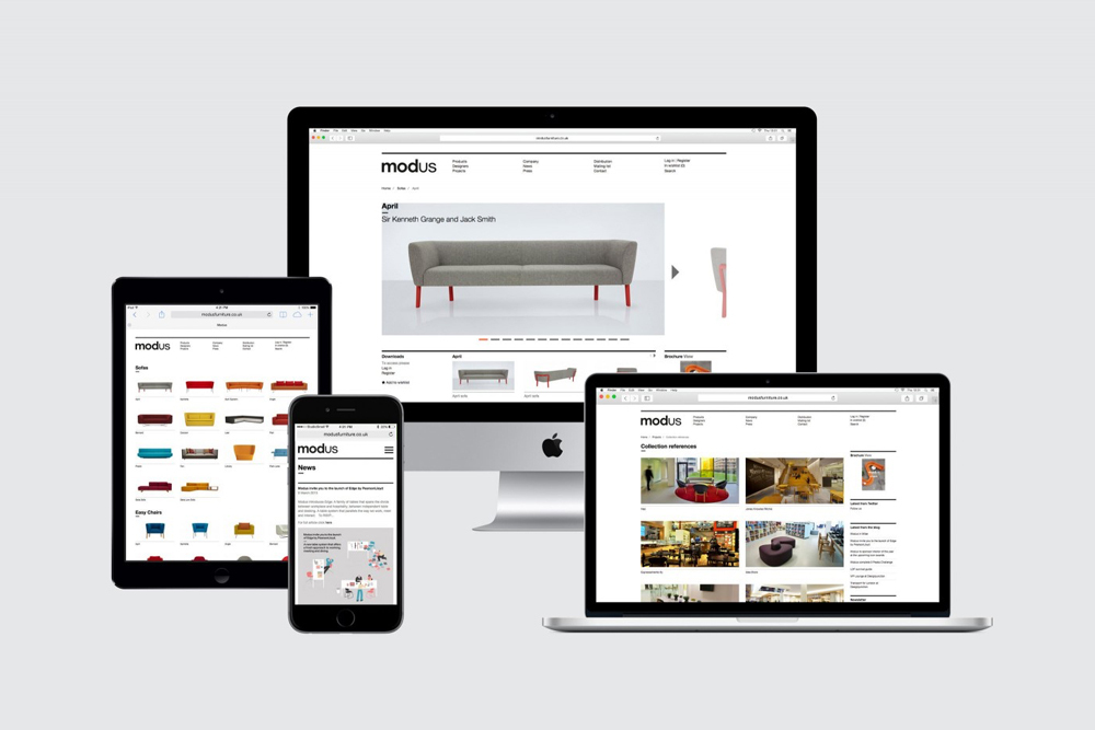 Multiple Apple devices including a desktop monitor, laptop, tablet, and smartphone displaying the Modus brand website against a light gray background.