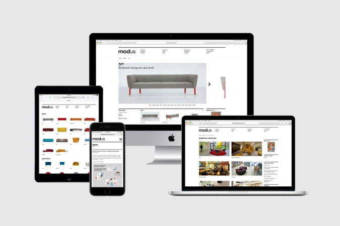 Multiple Apple devices including a desktop monitor, laptop, tablet, and smartphone displaying the Modus brand website against a light gray background.