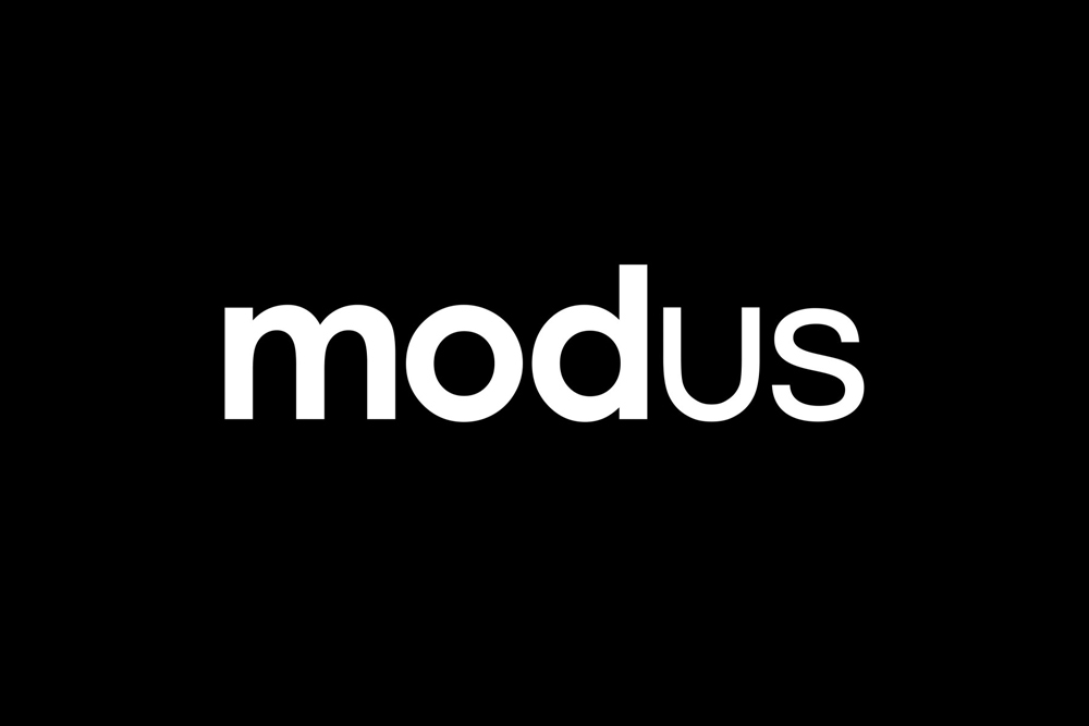 White lowercase typography spelling modus centered against a solid black background.
