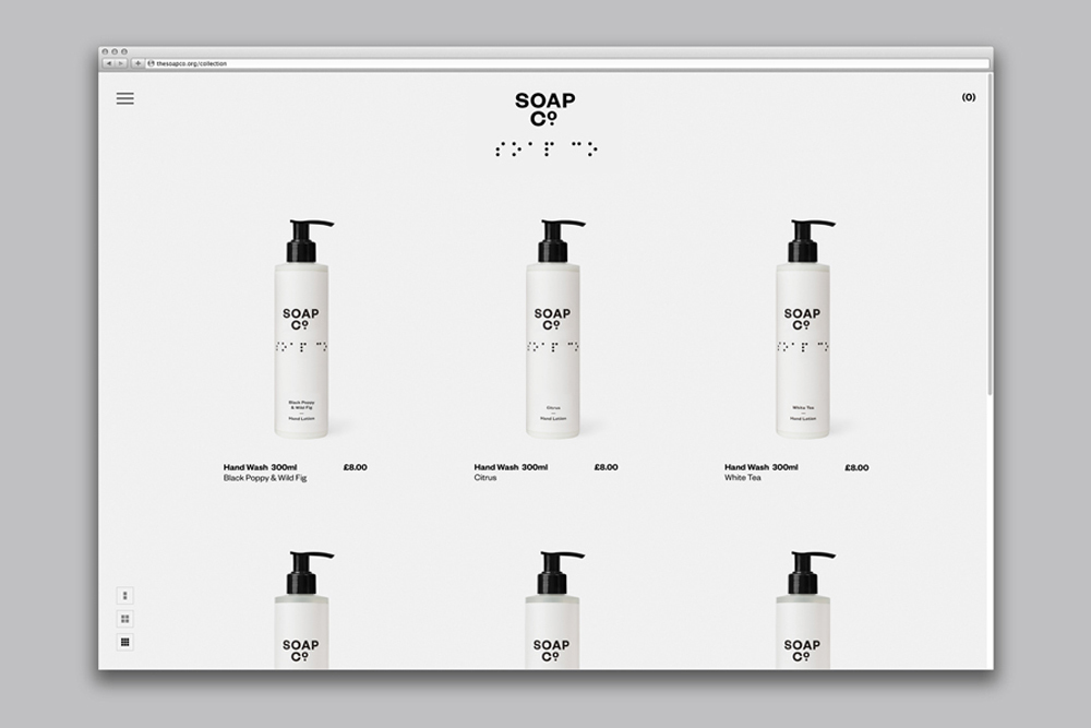 A screenshot of The Soap Co. e-commerce website showing a grid of hand wash bottles with clean typography against a white background.