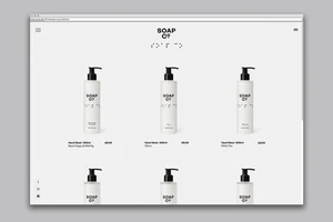 A screenshot of The Soap Co. e-commerce website showing a grid of hand wash bottles with clean typography against a white background.