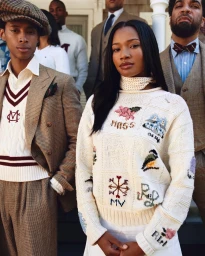 Group of diverse models wearing tailored heritage clothing and embroidered knitwear outdoors by Nadine Ijewere.