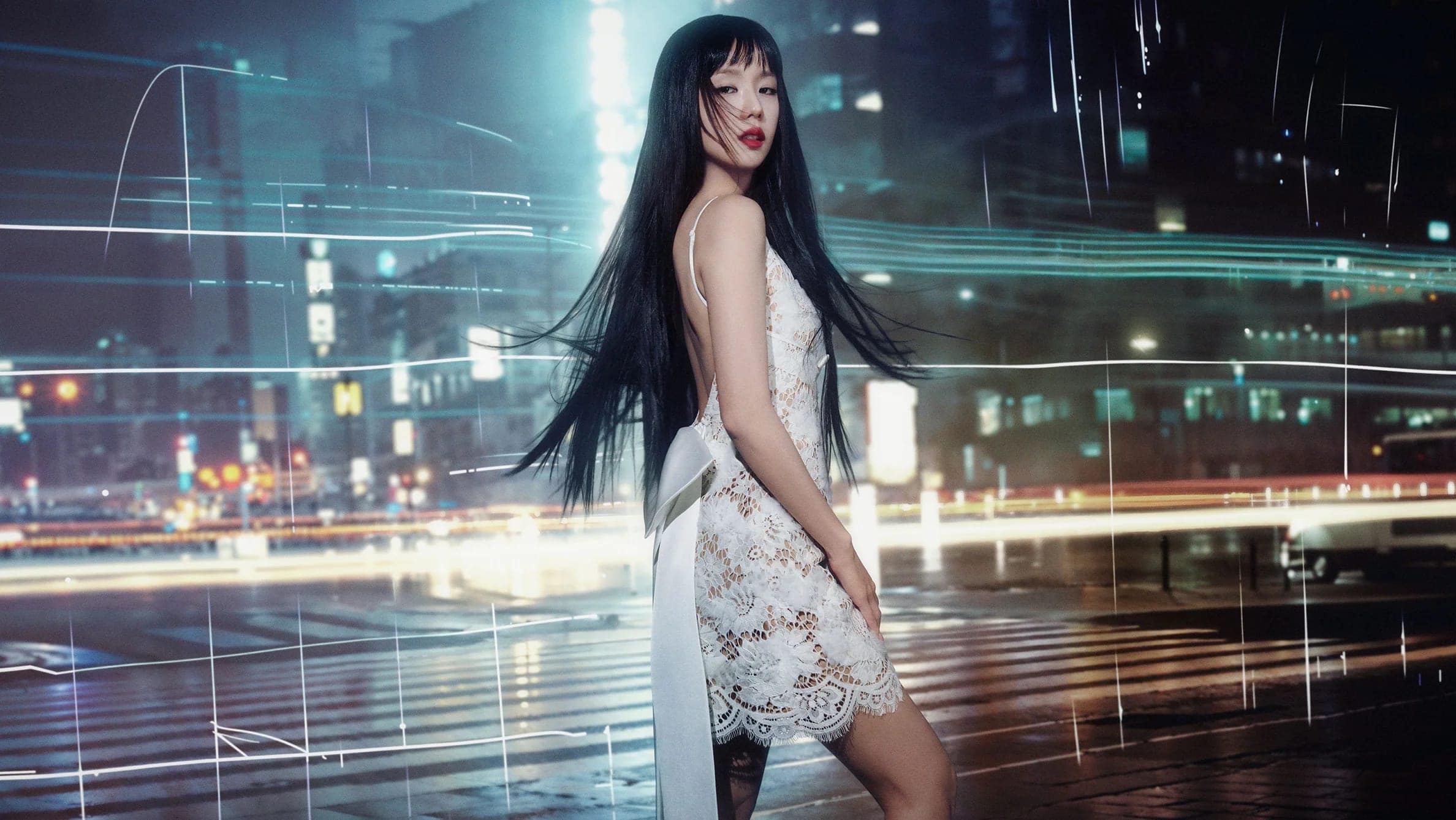 Jisoo in a white lace dress with long black hair standing on a city street at night with light streaks