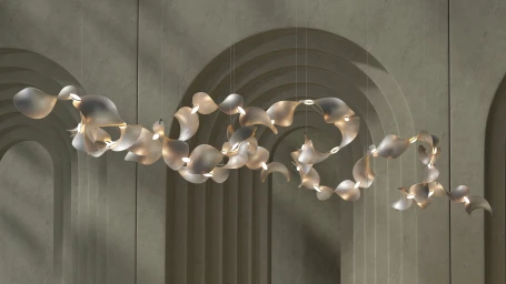 An organic sculptural pendant light installation suspended in front of an architectural wall with arched alcoves.
