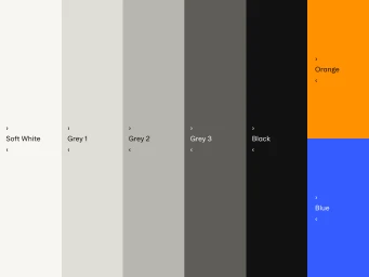 Brand identity color palette showcasing vertical color swatches ranging from soft white and various shades of grey to black, orange, and blue.