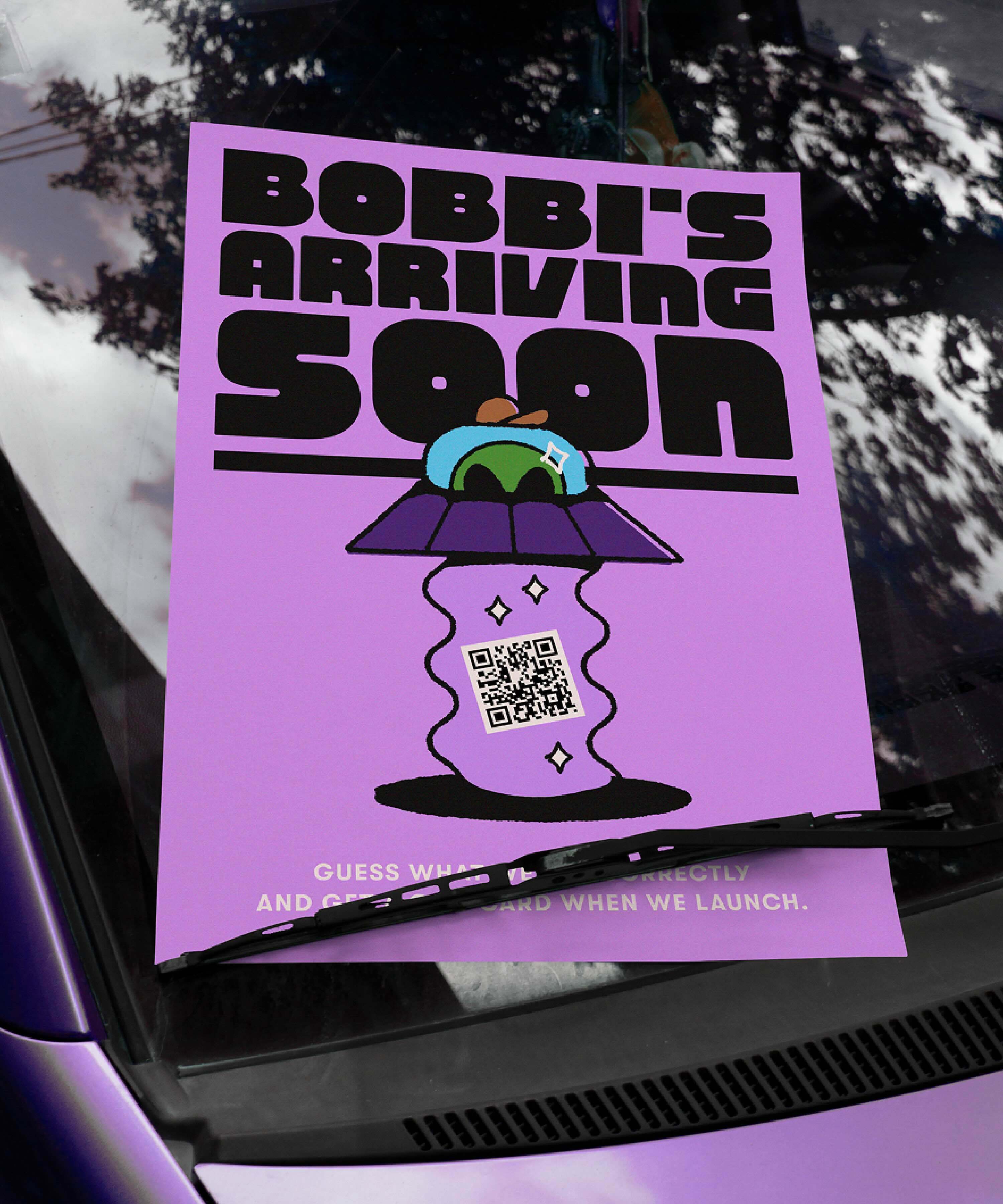 Purple promotional poster for Bobbis featuring a UFO graphic and QR code tucked under a car windshield wiper.