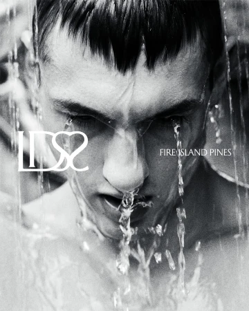 Close-up black and white portrait of a man under running water for Ludovic de Saint Sernin