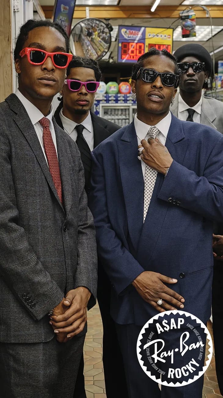 A$AP Rocky and other men in suits wearing sunglasses inside a convenience store for a Ray-Ban ad campaign