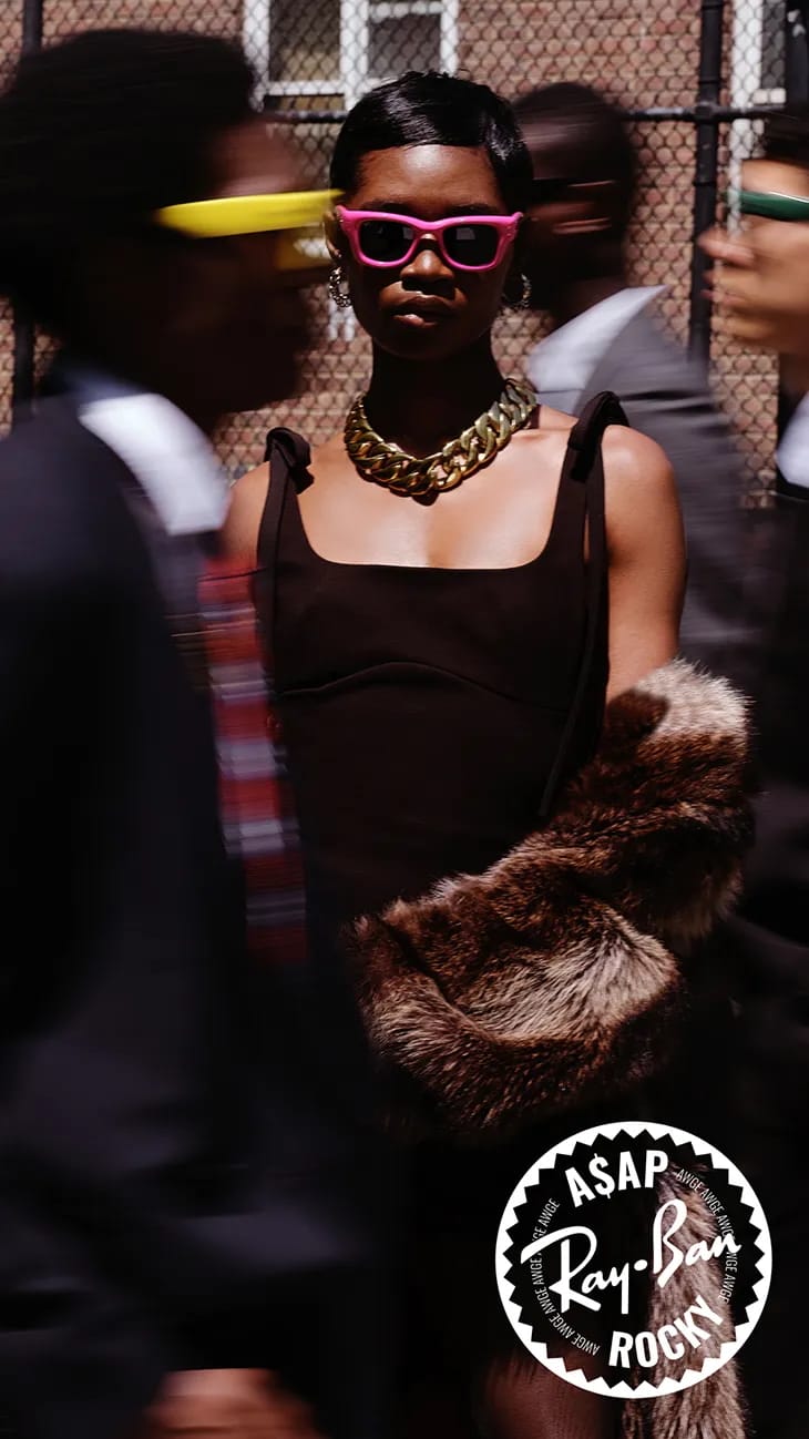 Woman in pink sunglasses and gold chain necklace holding fur stole for Ray-Ban ad campaign