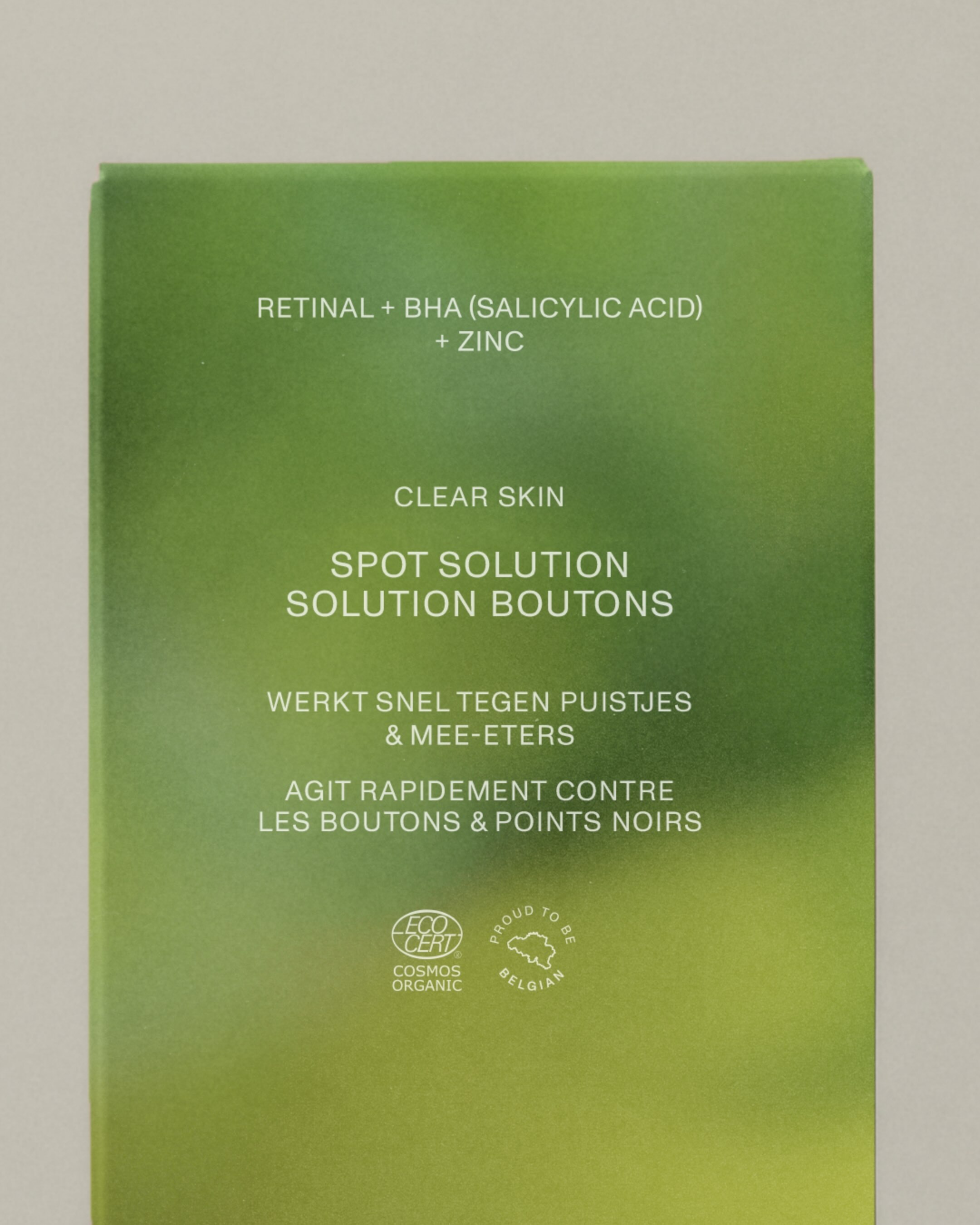 Green CIME spot solution skincare packaging with white text and organic certification logos