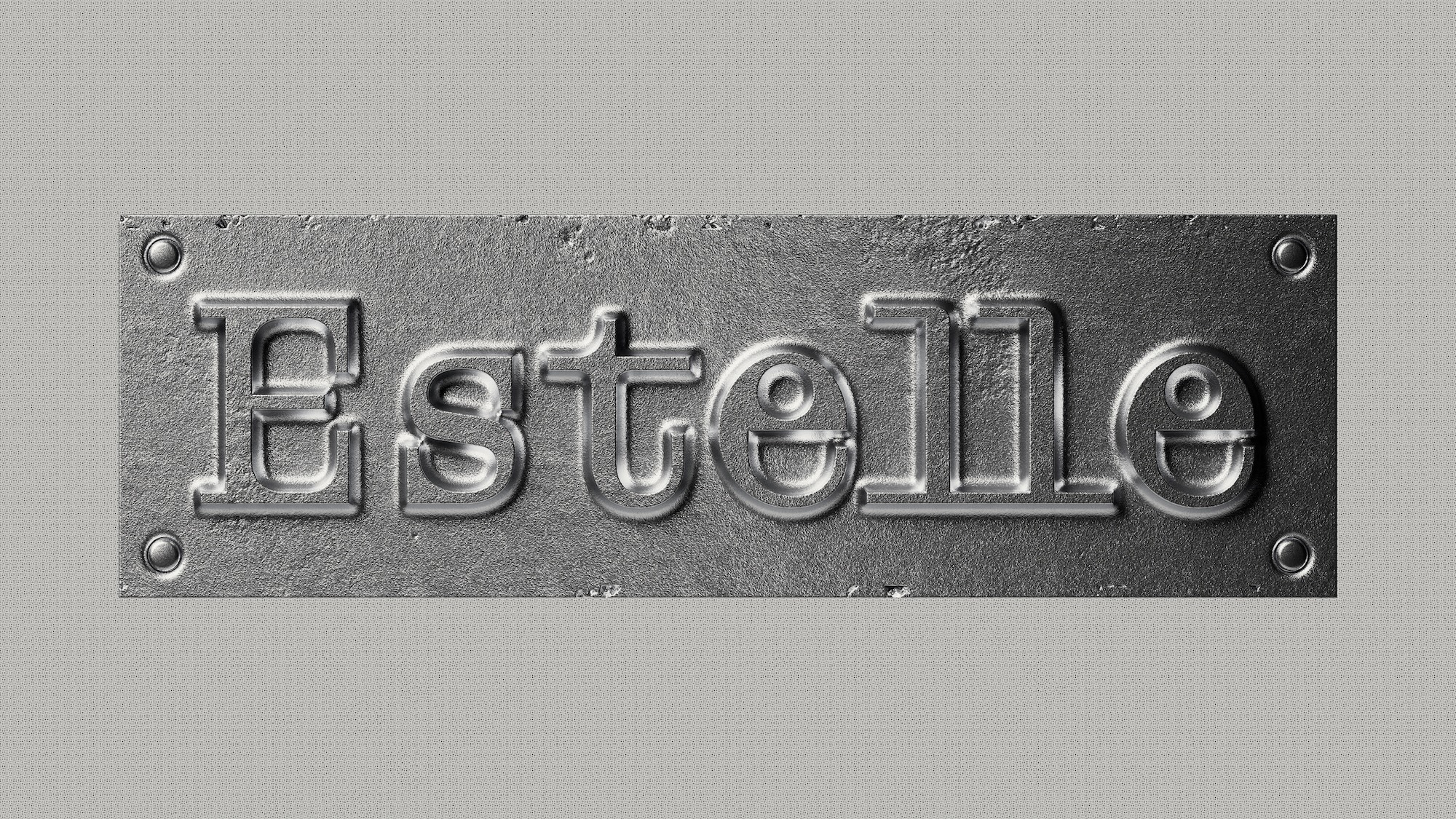 Embossed metal plate featuring the Estelle brand name with corner rivets against a textured grey background.