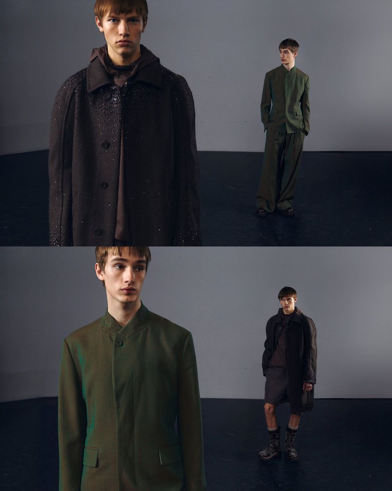 Four male fashion models pose in blazers, coats and trousers in a photo studio with a grey backdrop, portraying a modern, stylish aesthetic.