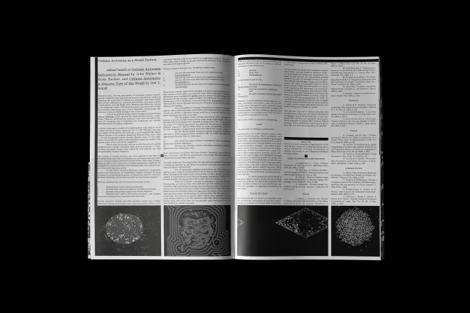 Open book layout featuring academic text and scientific diagrams on cellular automata against a dark background.