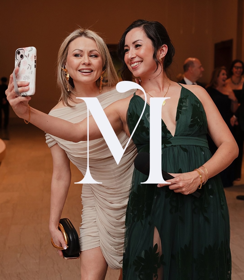 Two women taking a selfie together at an event for the Montreal Museum of Fine Arts brand identity