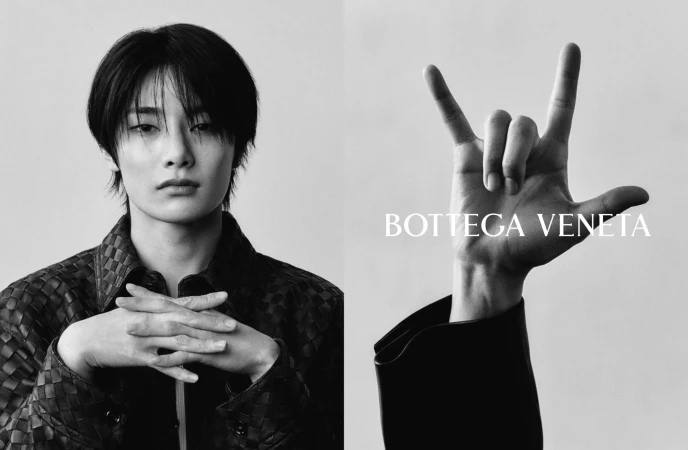 Monochrome portrait of I.N wearing a woven leather jacket with hand gesture for Bottega Veneta campaign