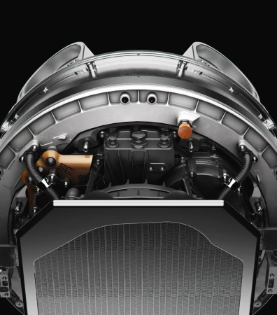Close up view of complex aerospace engineering machinery with metallic components and dark background for Joby Aviation