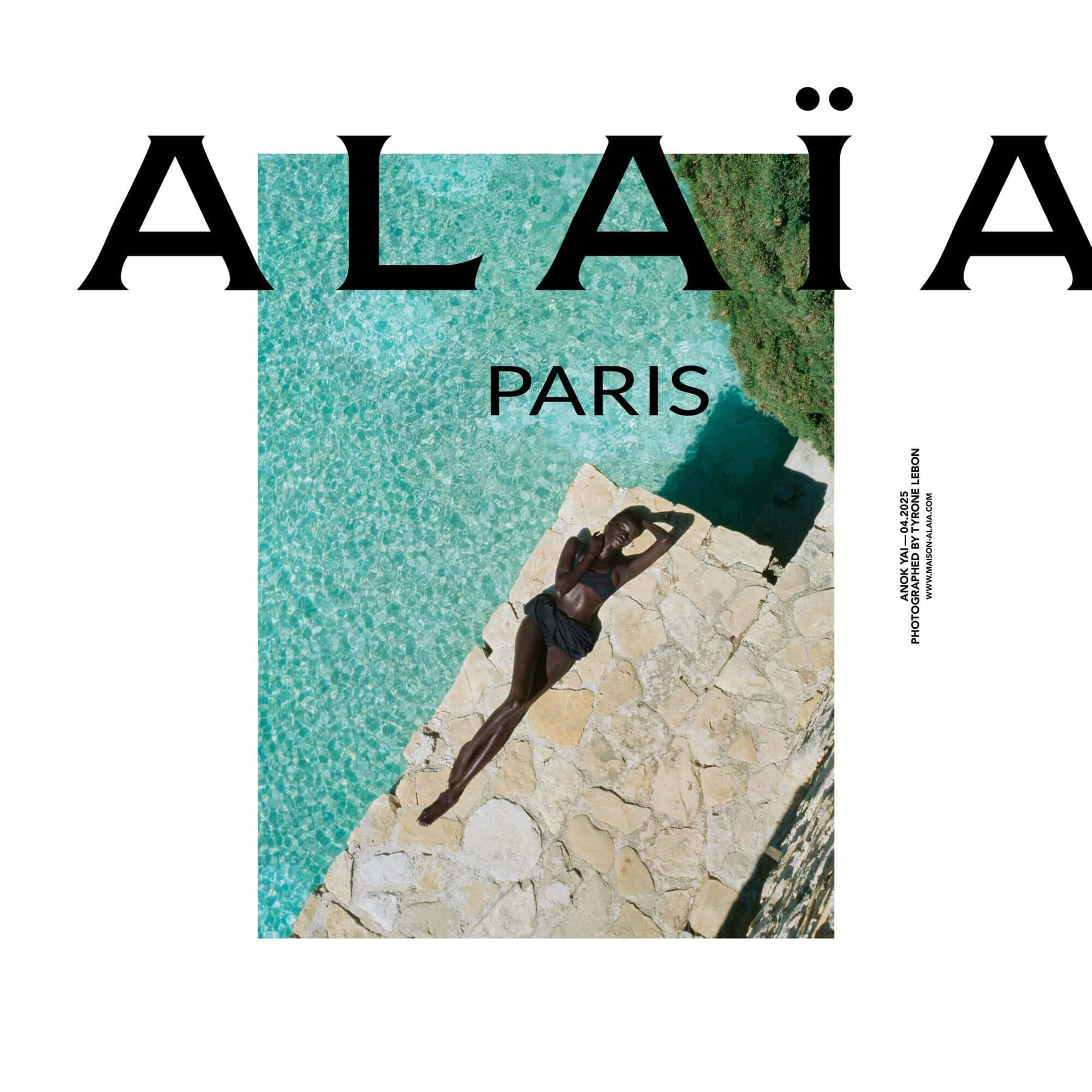 Anok Yai reclining on a stone poolside by turquoise water for the Alaïa Summer 2025 campaign photographed by Tyrone Lebon