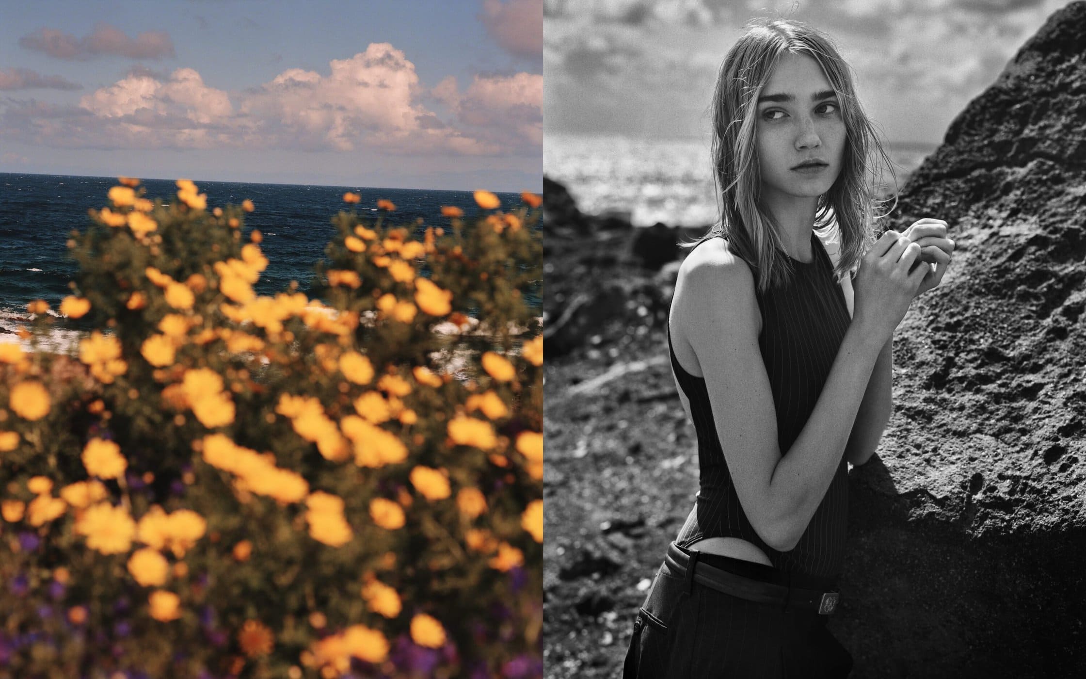 Monochrome fashion portrait of a female model standing by dark rocks with an ocean backdrop for Emporio Armani x Our Legacy Work Shop.