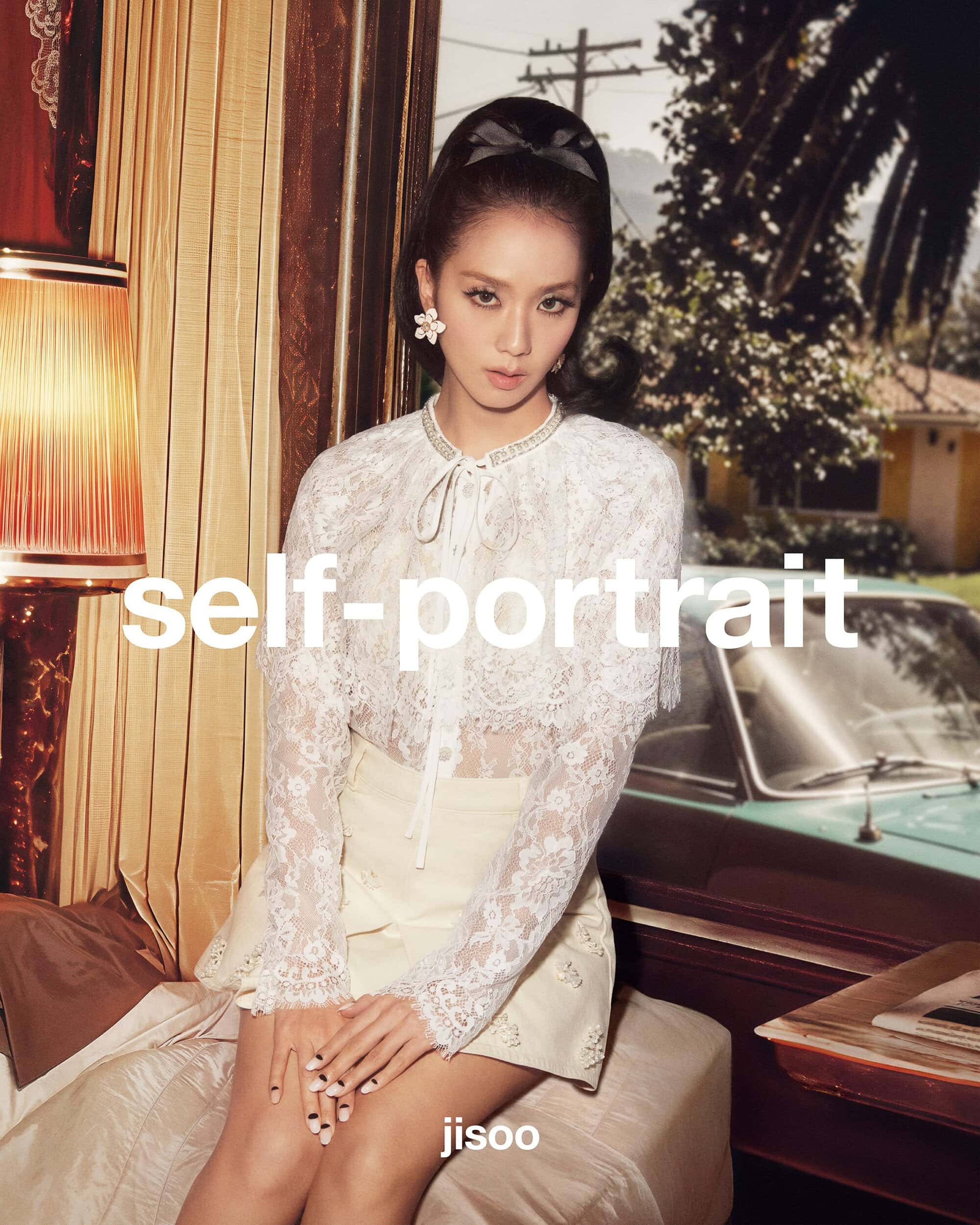Jisoo wearing a white lace blouse and light skirt indoors near a window with a parked car visible outside