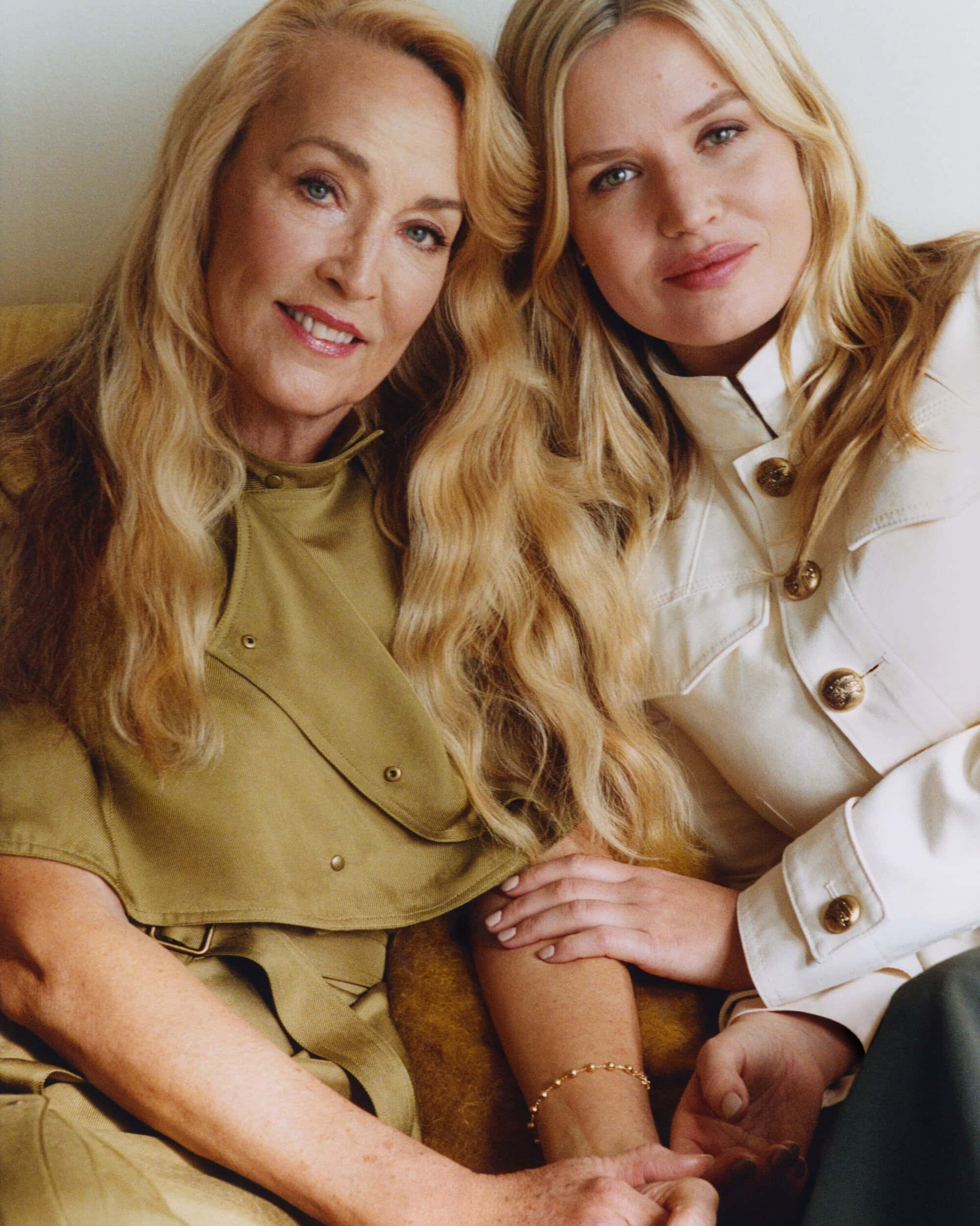 Portrait of Jerry Hall and her daughter Georgia May Jagger wearing Burberry jackets for Mother's Day 2025 campaign.