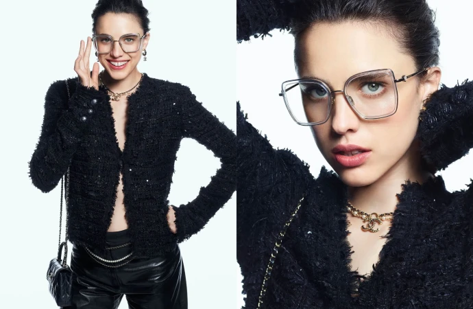 Model wearing clear frame eyeglasses and a black tweed jacket against a clean white background for Chanel Eyewear Spring 2025 campaign.