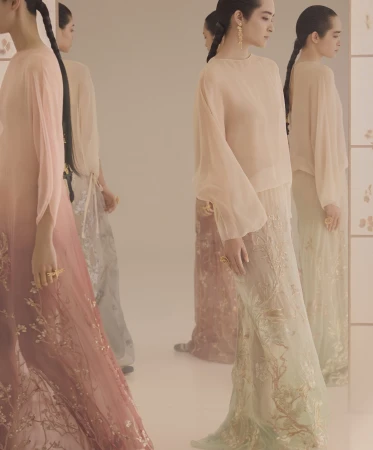 Models in long sheer gowns posing before mirrored panels for Dior Fall 2025 ad campaign captured by Yuriko Takagi