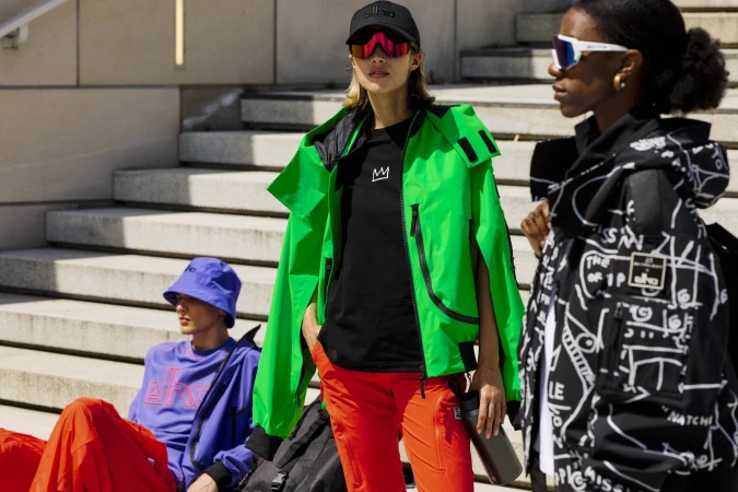Three models wearing colorful sportswear on outdoor concrete steps for Elho Spring 2025 ad campaign photographed by Felix Kruger.