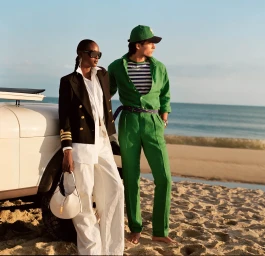 Models standing on a sandy beach next to a white vintage car during golden hour for Ralph Lauren Ralph's Hamptons campaign.