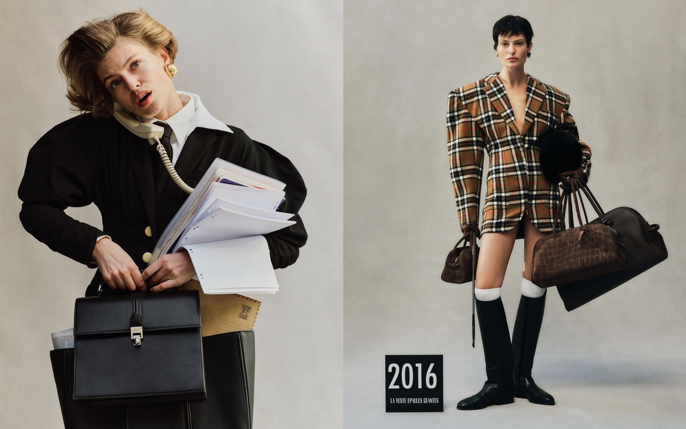 Two models in high fashion attire against a neutral grey seamless background, featuring structured jackets and leather handbags.