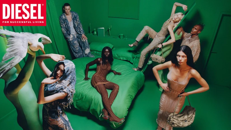 Group of diverse models in a monochromatic green room featuring a bed, set-dressed by Diesel for Spring 2025.