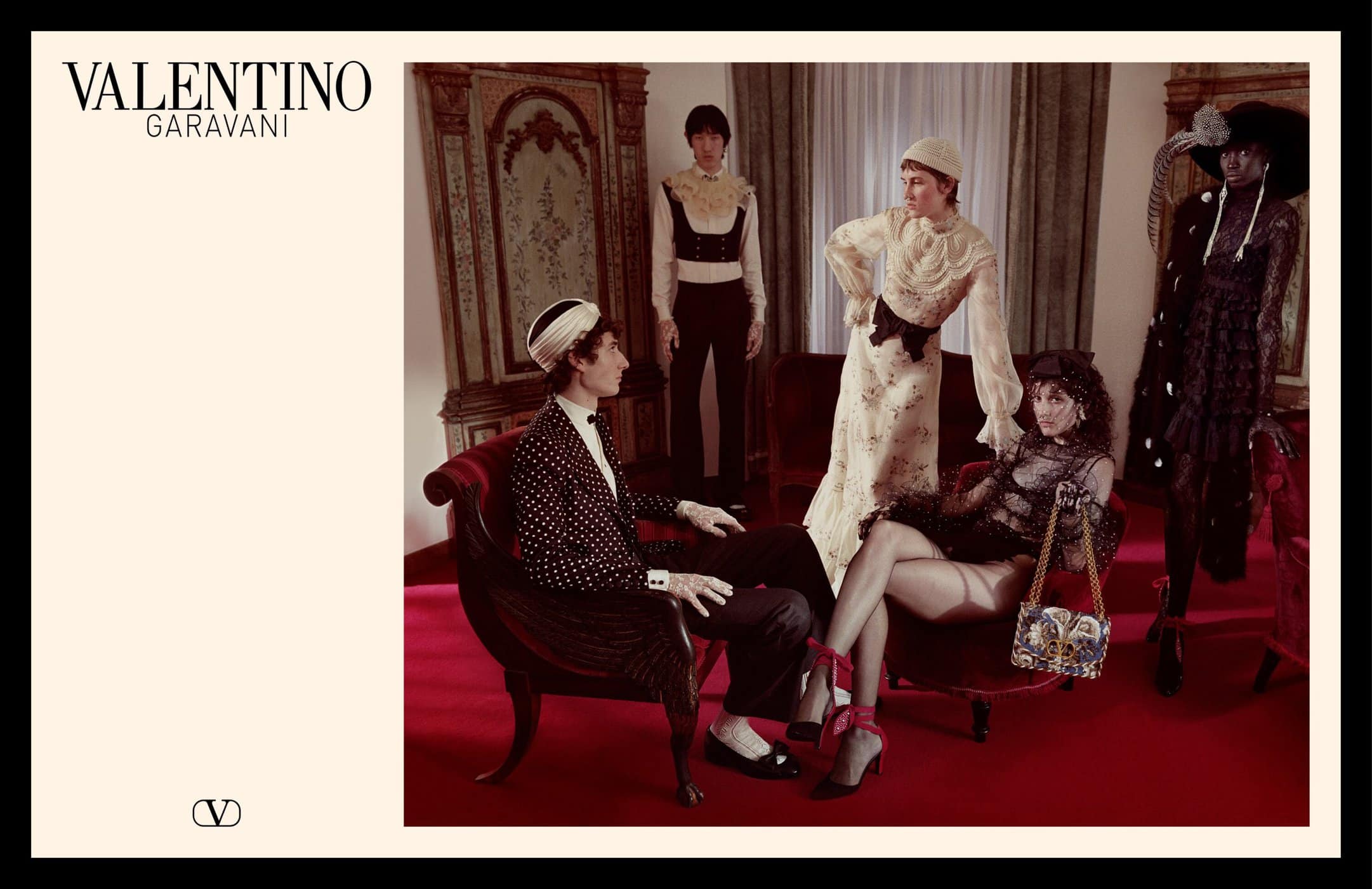 Valentino Garavani spring 2025 ad campaign featuring models posed in a lavishly decorated interior with red carpeting.