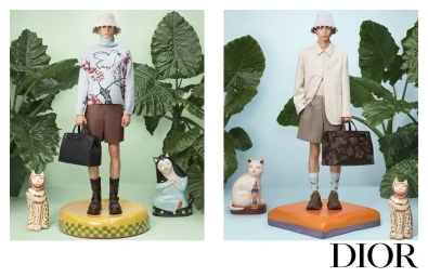 Dior spring 2025 ad campaign featuring models posing with structured handbags amidst large tropical leaves and ceramic cat figures.