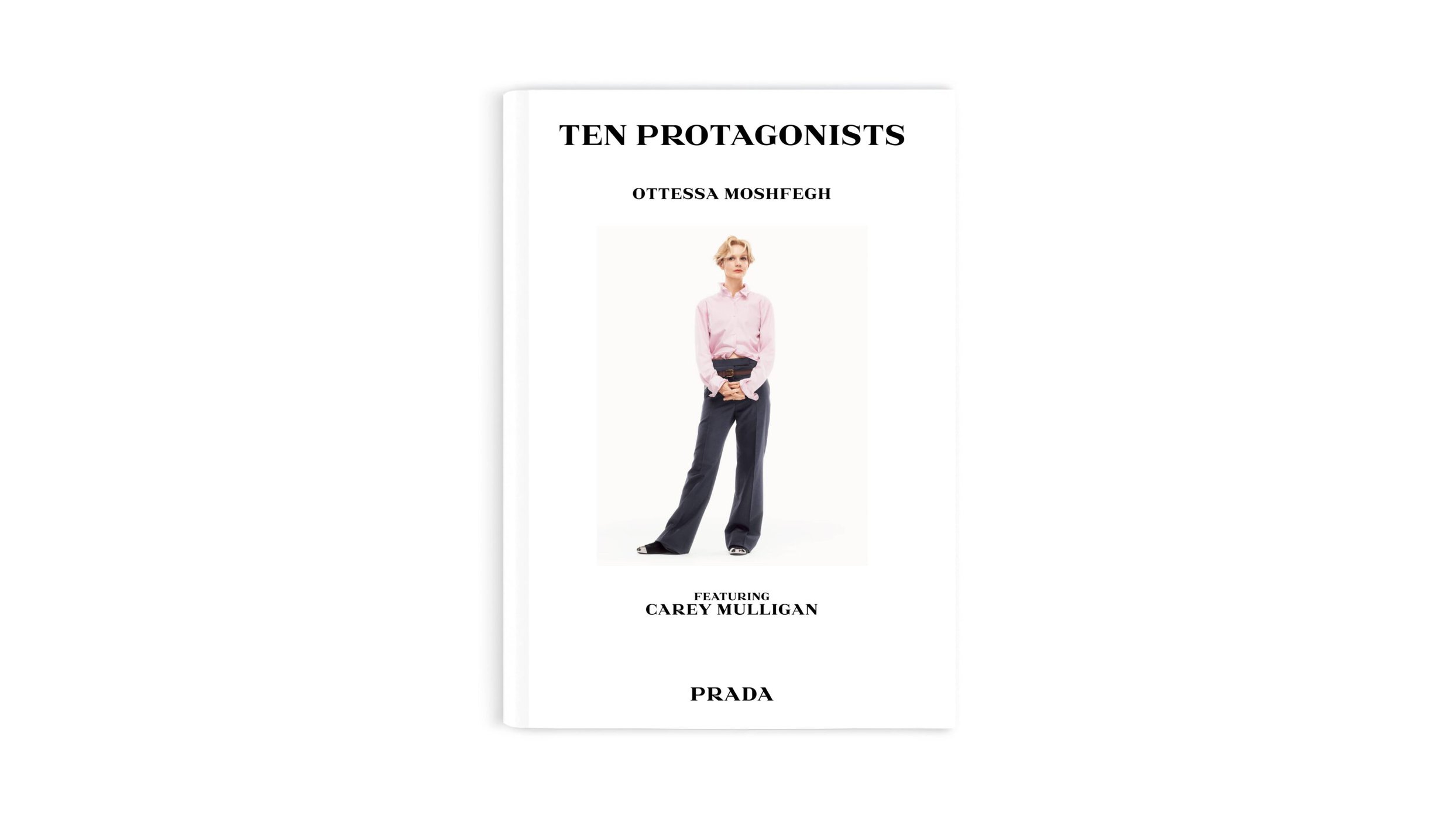 Carey Mulligan featured in Prada Acts Like Prada ad campaign wearing a pink shirt and dark trousers against a white backdrop