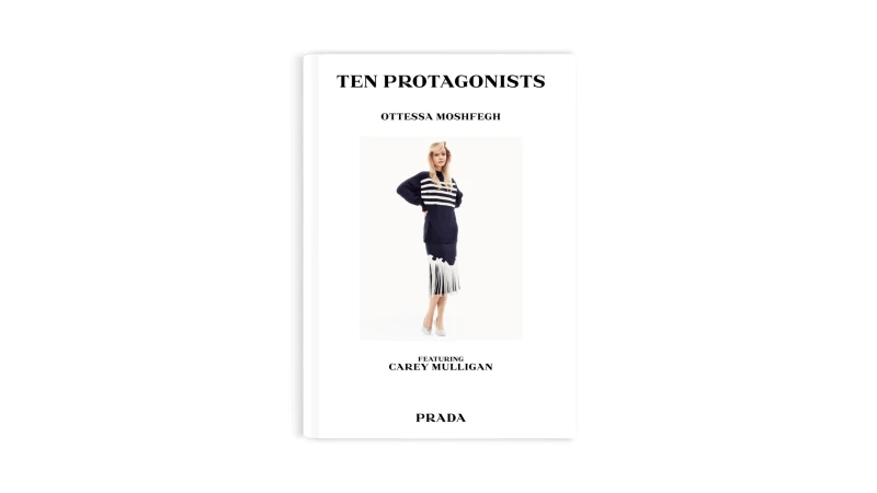 Carey Mulligan wearing a navy striped sweater and skirt on a white background for Prada.