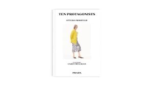 Book cover featuring Carey Mulligan wearing a yellow jacket and patterned skirt against a plain white background for Prada.