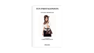 Book cover featuring Carey Mulligan in white blouse holding a brown handbag against white background for Prada ad campaign