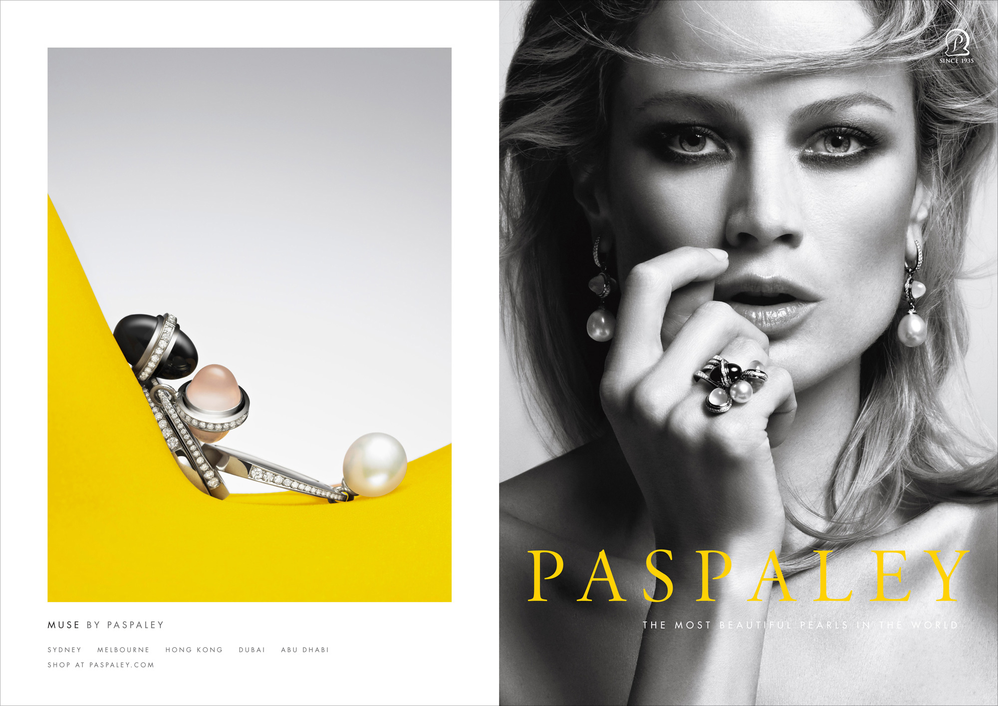 Paspaley jewellery ad: a fair-skinned adult woman models pearl earrings and ring, with a pearl necklace on a yellow surface.