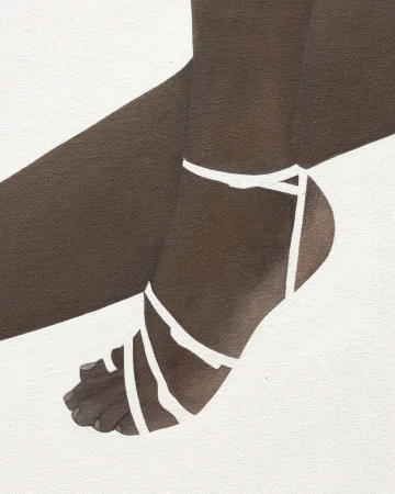 Close-up of a person's foot wearing white strappy sandals against a textured canvas background for Paul Andrew Spring 2025 campaign.