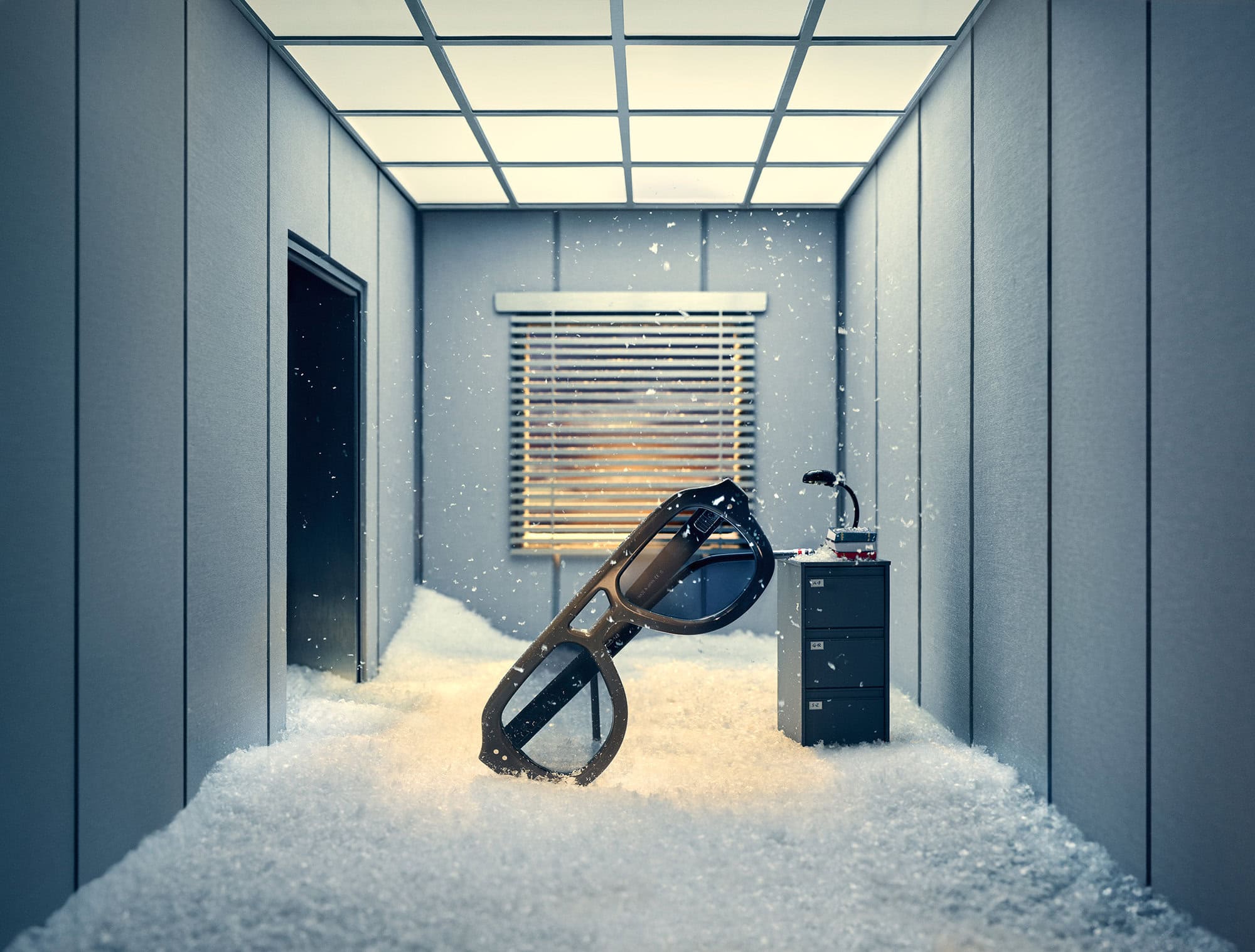 Oversized sunglasses resting in a snowy office interior for Thom Browne Holiday 2024 Ad Campaign