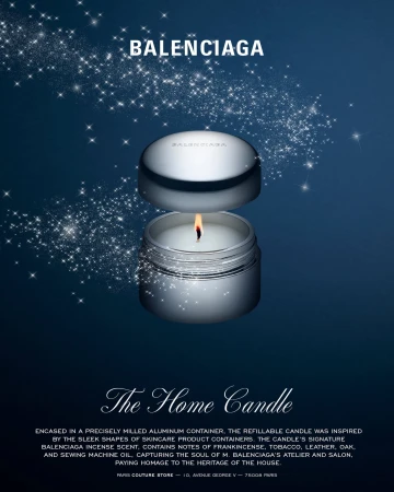 Balenciaga luxury scented candle in a silver aluminum container with floating lid and sparkling star trails