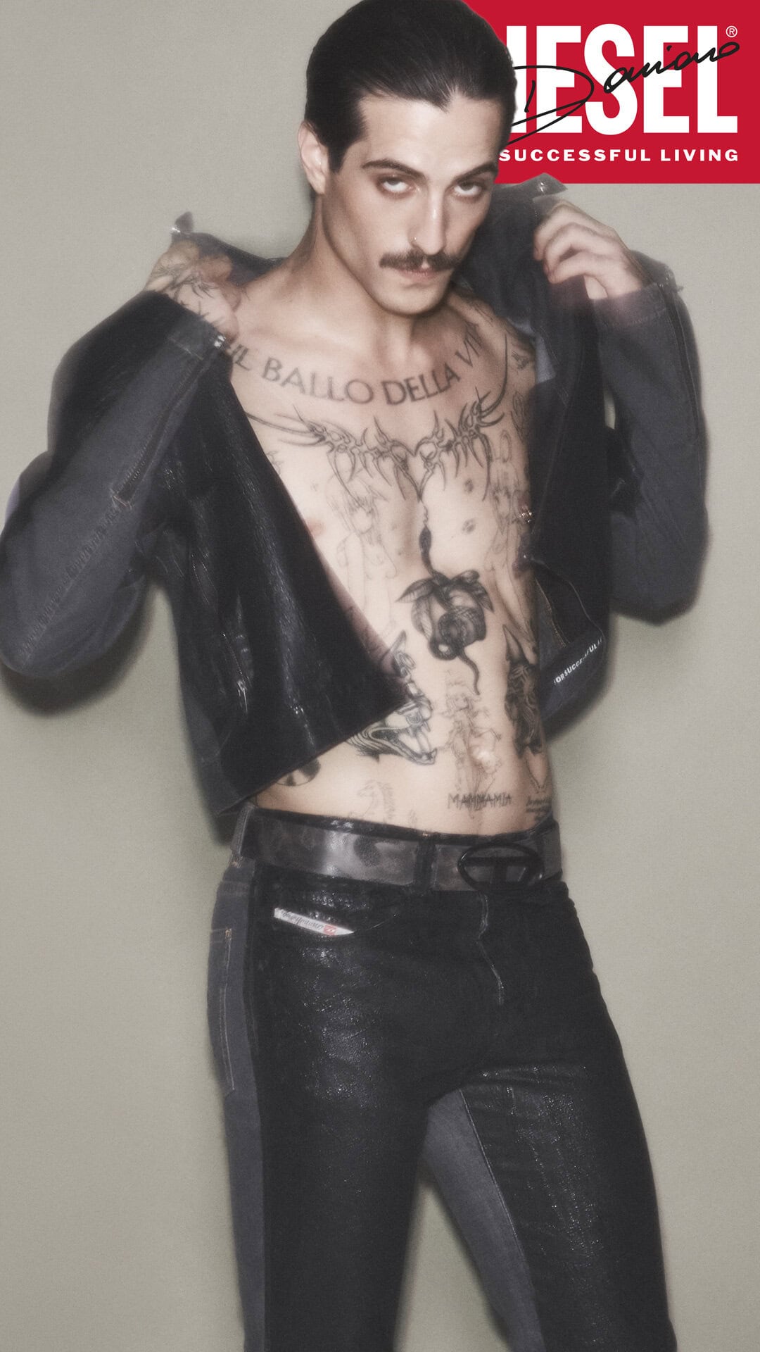Damiano David in dark jacket and jeans against neutral studio background for Diesel Fall 2024 campaign