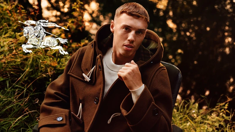 Cole Palmer in a brown duffle coat outdoors for the Burberry It is Always Burberry Weather campaign