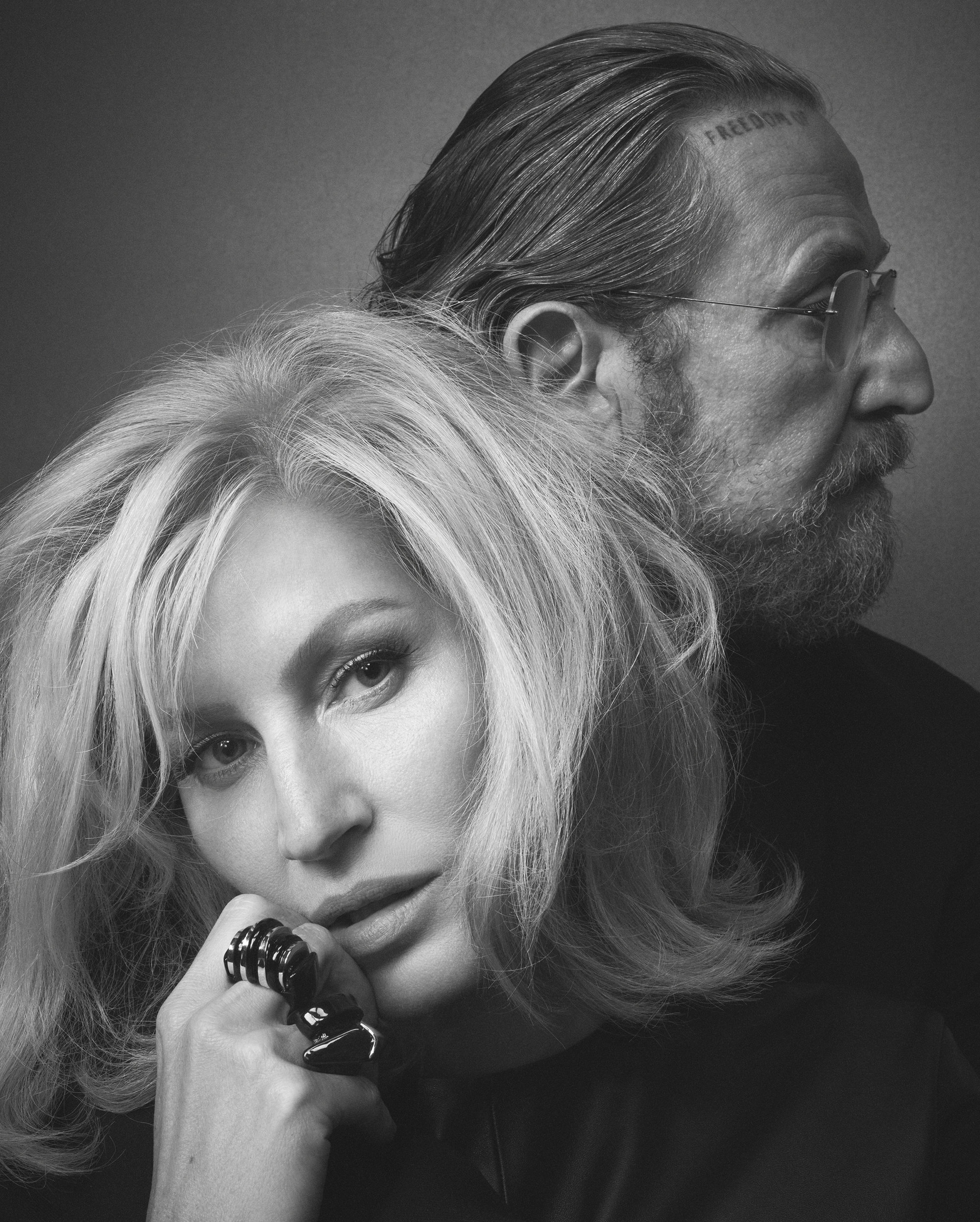 Monochrome portrait of Gisele Bundchen and Stefano Pilati posing closely together for Zara Fall 2024 ad campaign