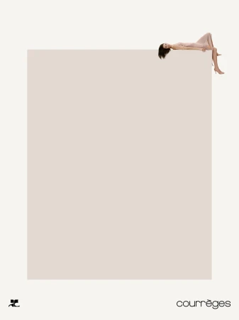 Model lying on the edge of a minimal block against a white background for the Courrèges Fall 2024 campaign